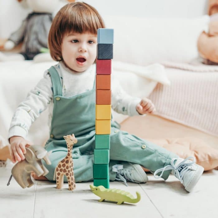 kid playing with blocks