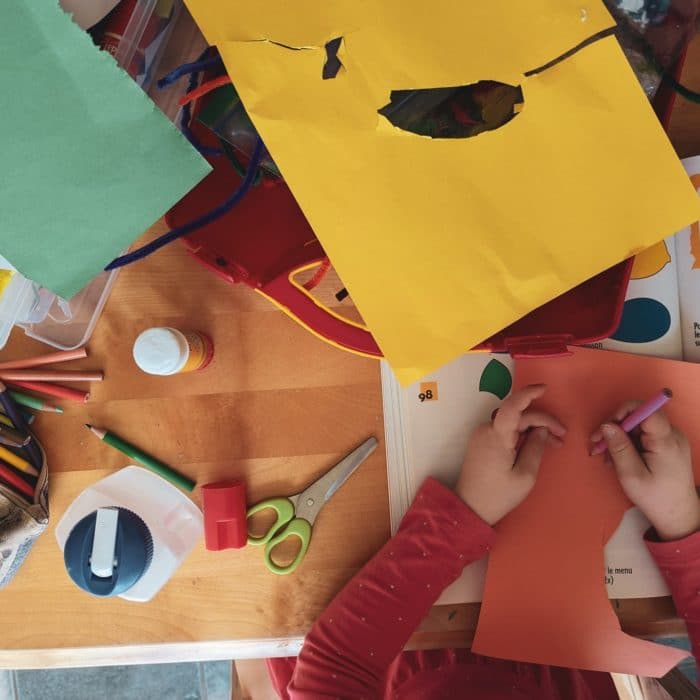 child doing crafts