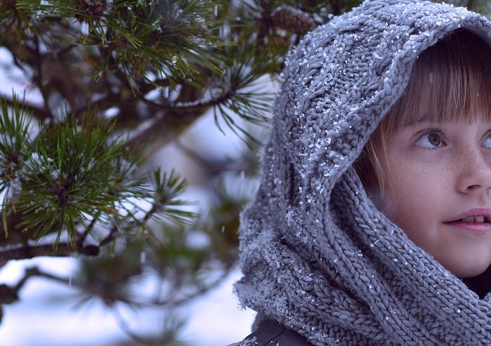 child in knitted hood