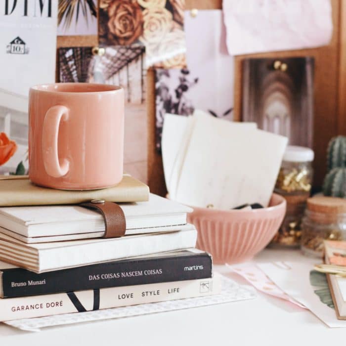 coffee-mug-on-stack-of-books