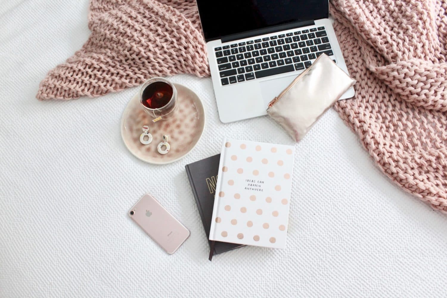 knitted blanket, laptop, tea