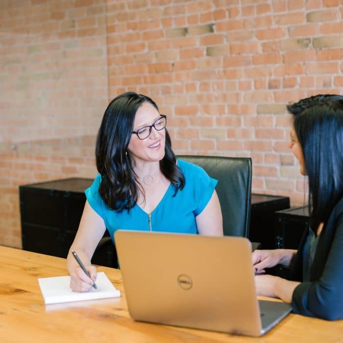 two women in a meeting