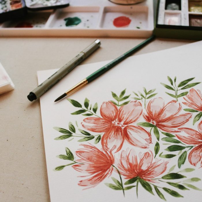 watercolor flowers on a paper and napkin