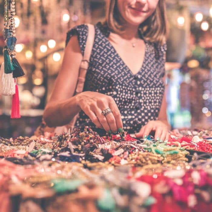 woman buying beads
