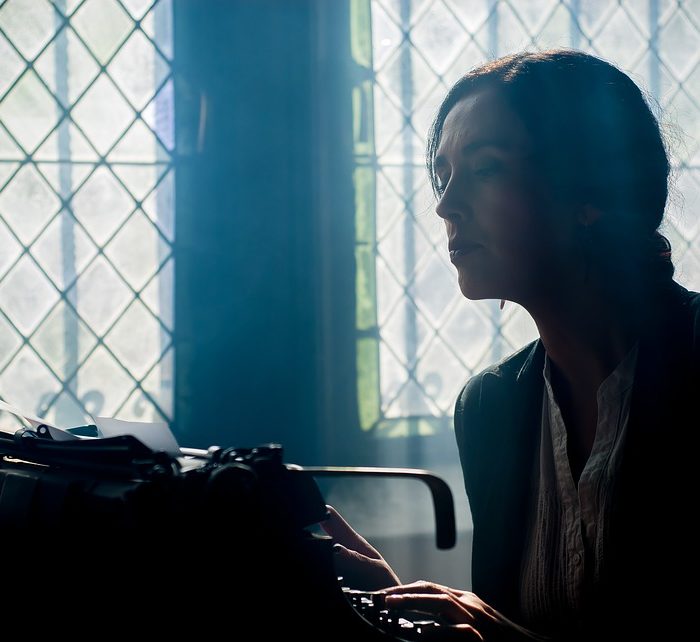 woman on typewriter