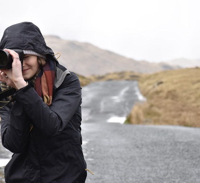 woman taking photos