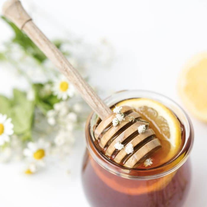 jar of honey and flowers