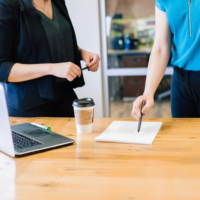 people at desk working