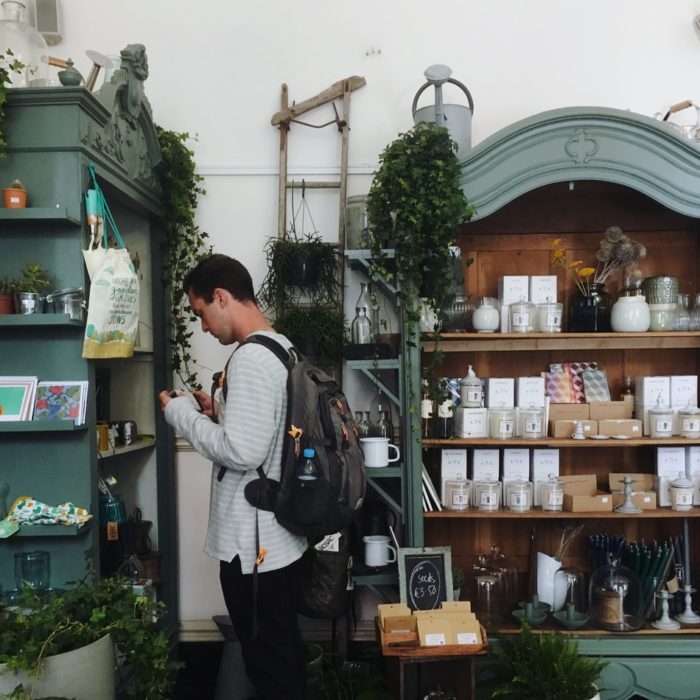 man browsing a gift shop