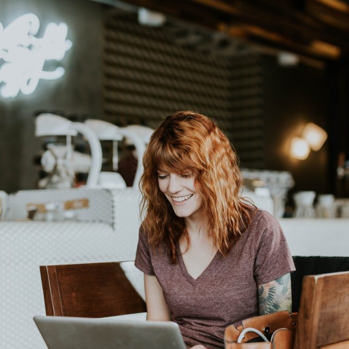 woman on laptop in living room